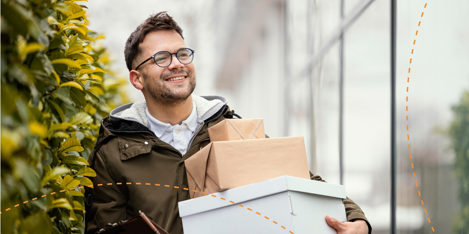 image of person holding stack of boxes