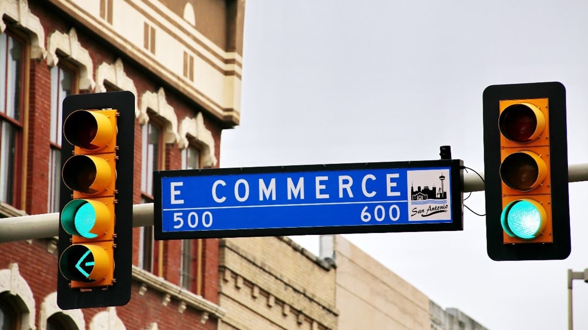 ECommerce Street Sign Surrounded by Green Lights